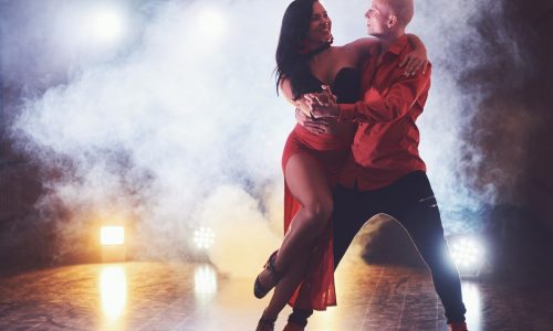 skillful-dancers-performing-dark-room-concert-light-smoke-sensual-couple-performing-artistic-emotional-contemporary-dance_146671-14536